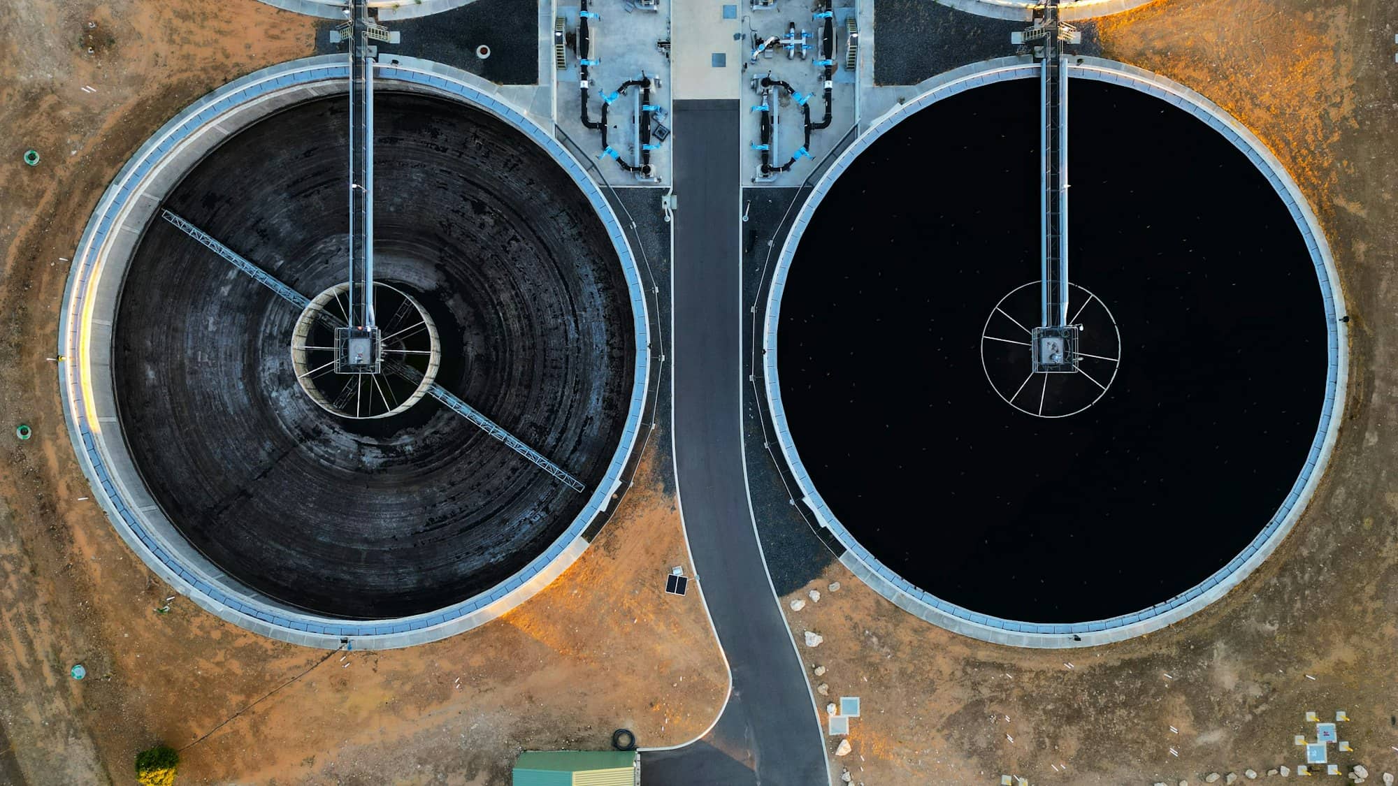 Two circular treatment tanks seen from directly above